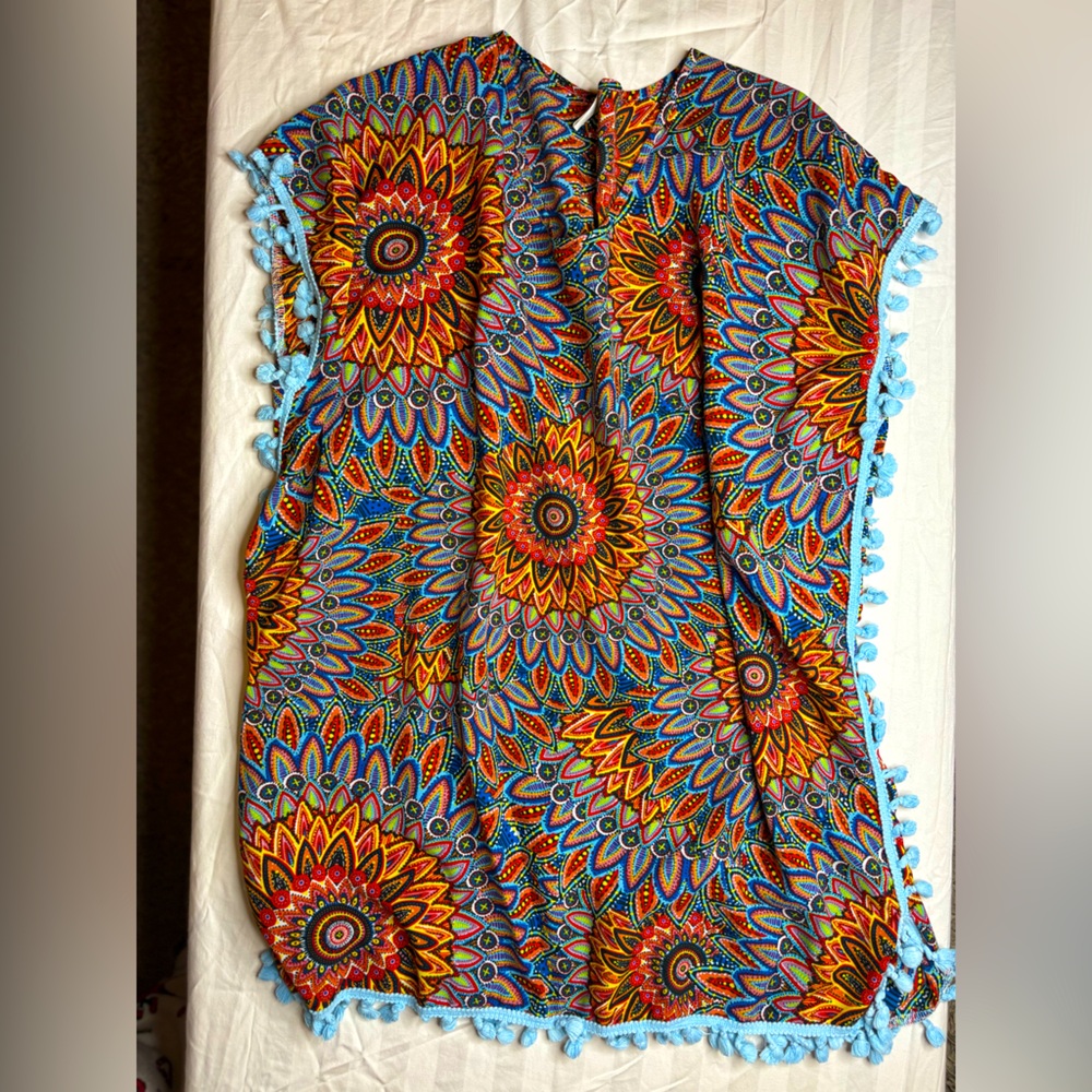Yincro boho-style swim cover-up with cute blue pom pom tassels
